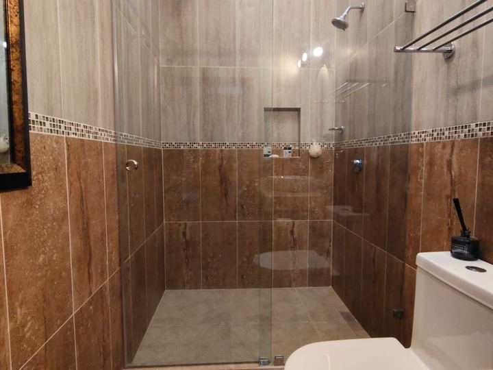 Cancel de baño esquinero en vidrio templado